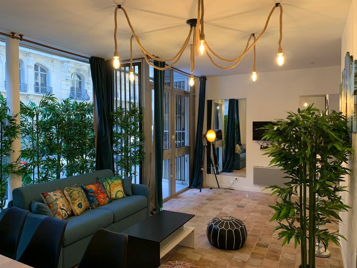 In front of the Eiffel Tower and shops, air-conditioned